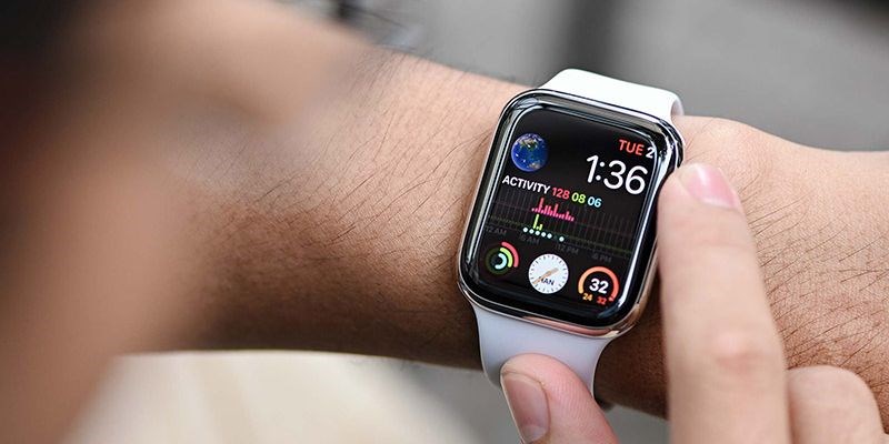 Smartwatch screen displaying live betting odds through the OKBET app.